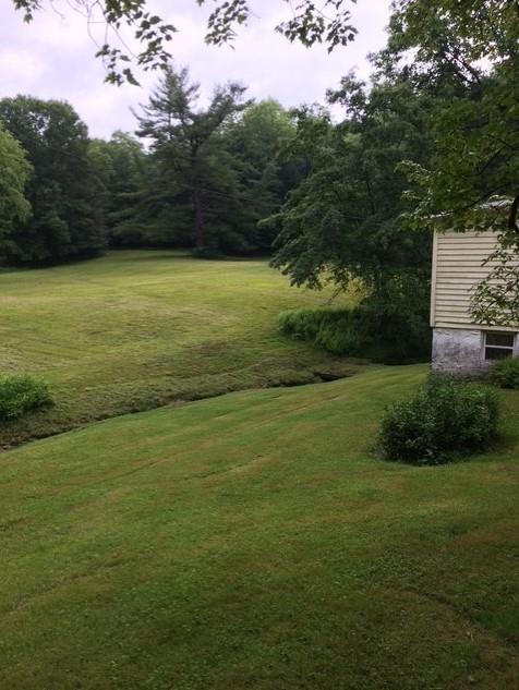 245 Higgins Road Hilliards, PA 16040 - Photo 5 of 13 a view of a field with an ocean view