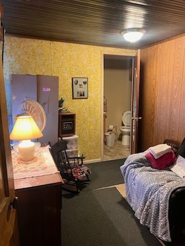 245 Higgins Road Hilliards, PA 16040 - Photo 7 of 13 a bedroom with a bed and a lamp