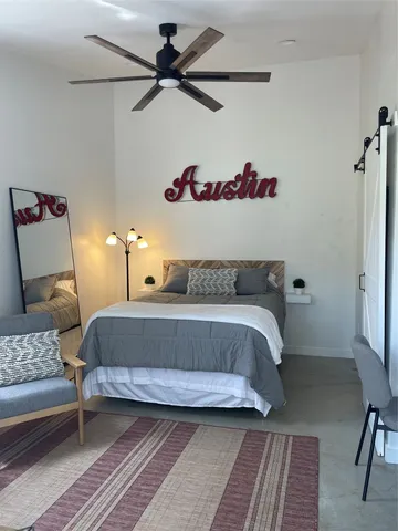 a bathroom with a sink and mirror
