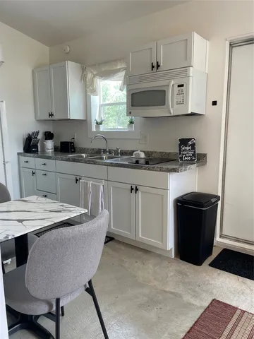 a view of a yard with plants