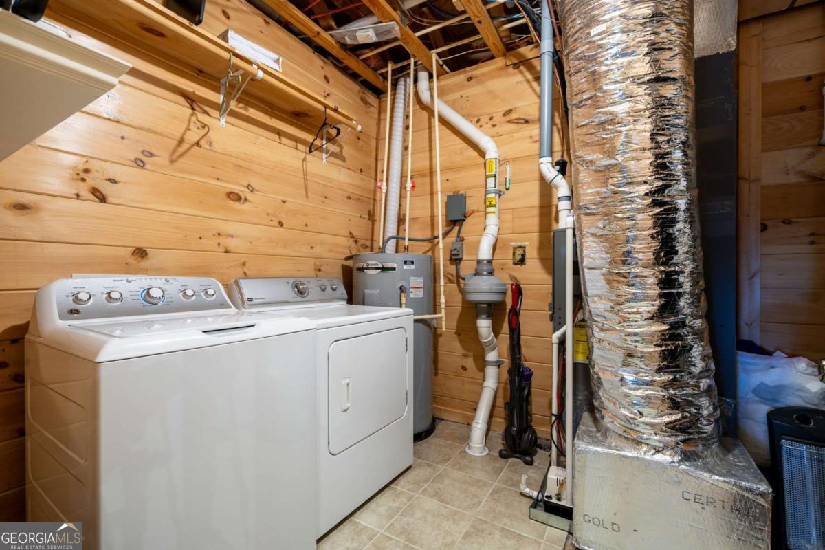 165 Christian Crossing, Unit 15 Morganton, GA 30560 - Photo 49 of 58 a utility room with dryer and washer