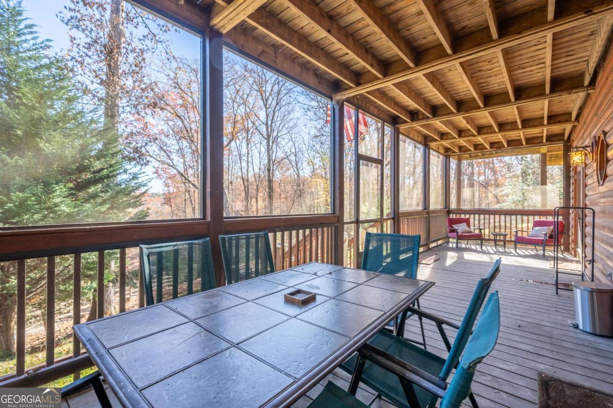 165 Christian Crossing, Unit 15 Morganton, GA 30560 - Photo 50 of 58 a view of a balcony with furniture