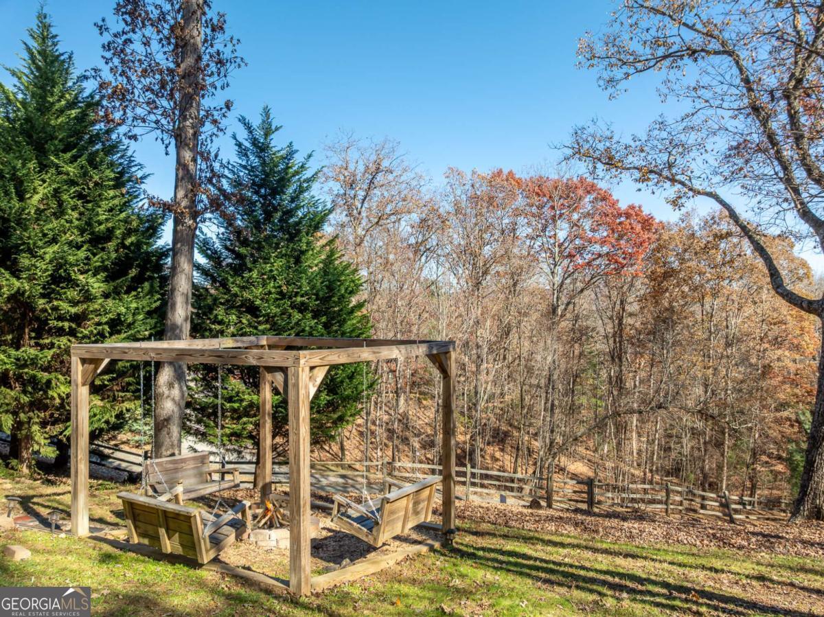 165 Christian Crossing, Unit 15 Morganton, GA 30560 - Photo 6 of 58 a view of a balcony with mountain view