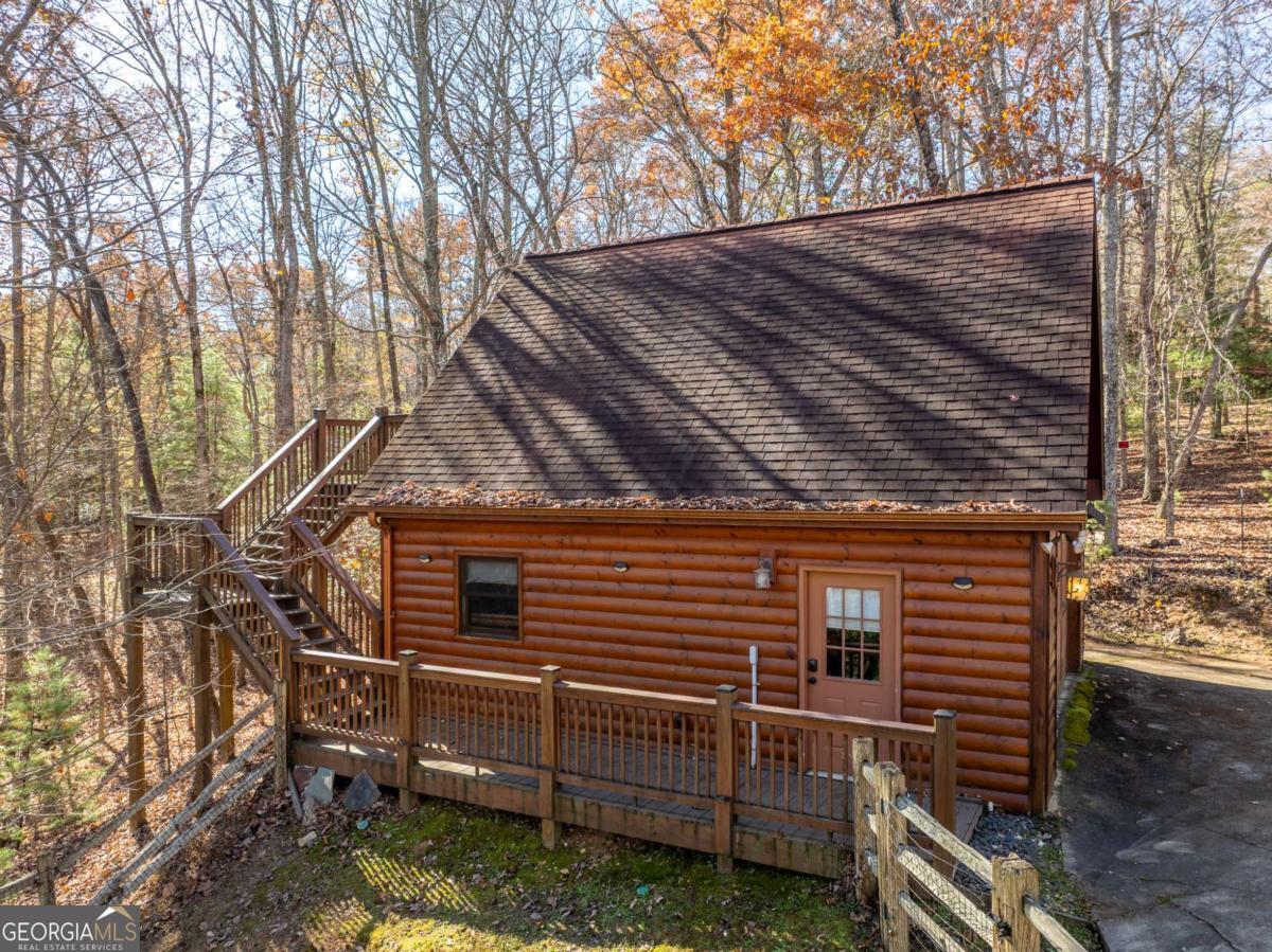 165 Christian Crossing, Unit 15 Morganton, GA 30560 - Photo 10 of 58 a view of a house with a yard