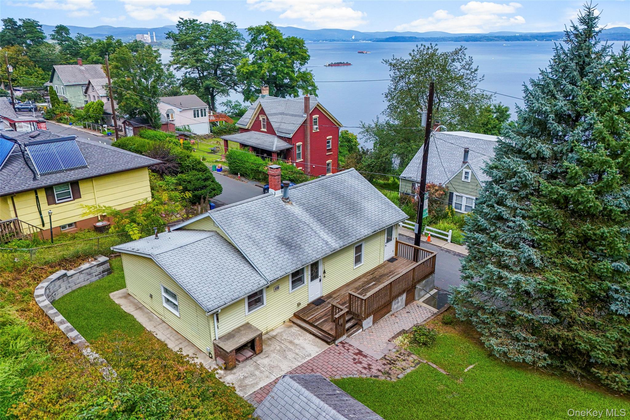 1 Riverside Avenue Haverstraw, NY 10927 - Photo 1 of 1 Aerial view of residential area with water and mountain views