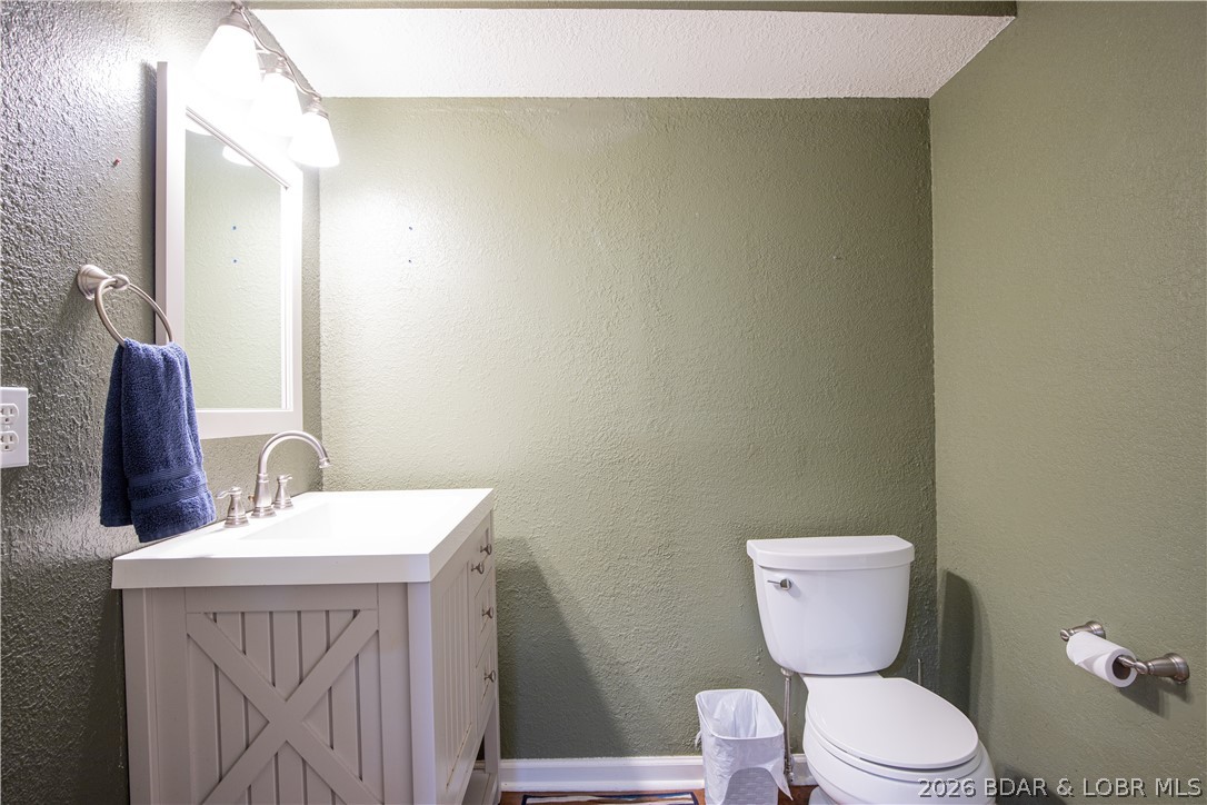 258 Northview Road Sunrise Beach, MO 65079 - Photo 27 of 35 Lower Level Half Bath