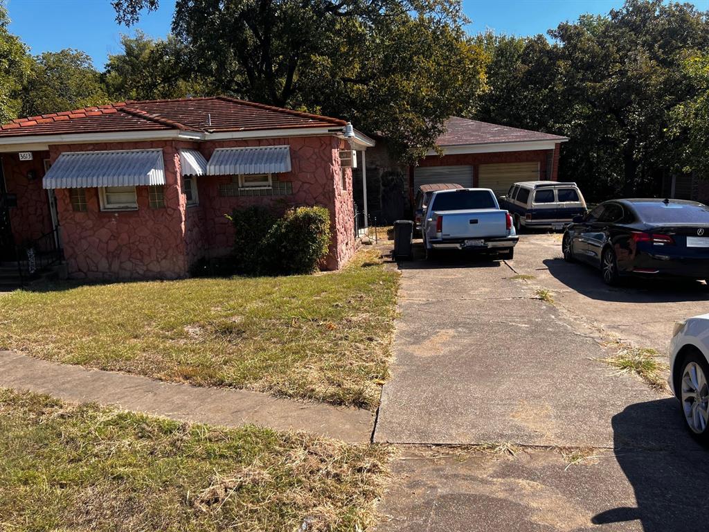 3613 Williams Road Fort Worth, TX 76116 - Photo 13 of 31 a view of a car parked in front of house