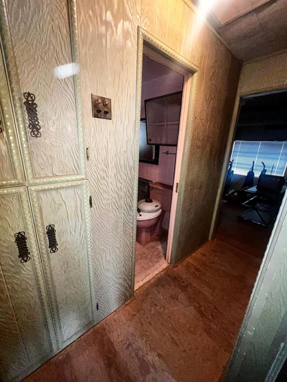 3613 Williams Road Fort Worth, TX 76116 - Photo 25 of 31 a bedroom with a bed and a mirror