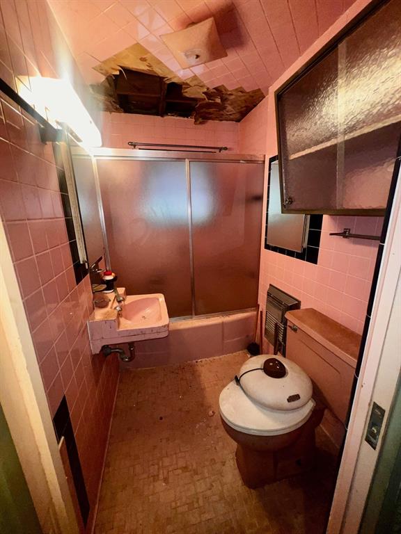 3613 Williams Road Fort Worth, TX 76116 - Photo 31 of 31 a bathroom with a toilet and a shower