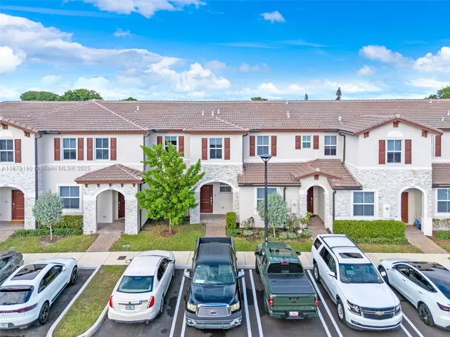 a view of a city with an ocean view