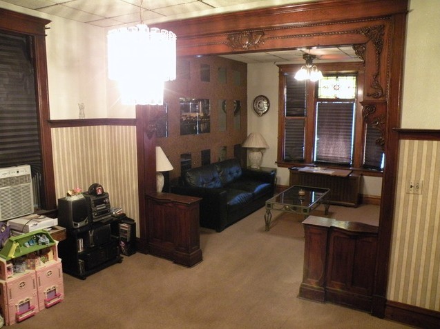 7235 Roosevelt Road Forest Park, IL 60130 - Photo 4 of 12 a living room with furniture and a window