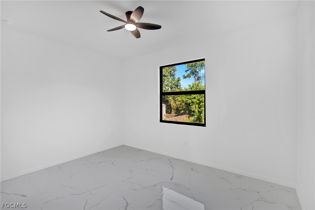 5231 6th Street West Lehigh Acres, FL 33971 - Photo 17 of 26 a view of an empty room