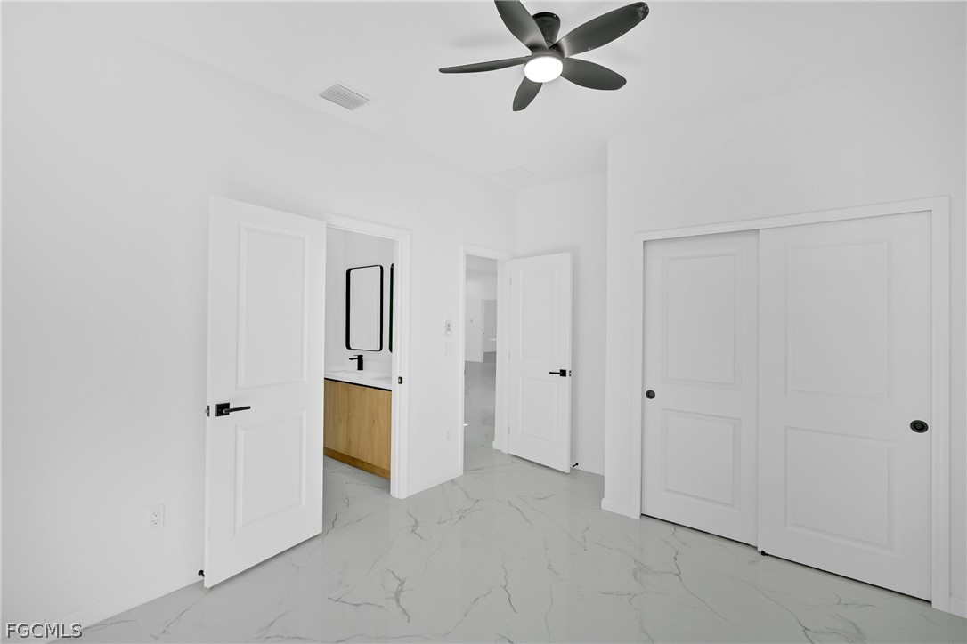 5231 6th Street West Lehigh Acres, FL 33971 - Photo 18 of 26 a view of an empty room