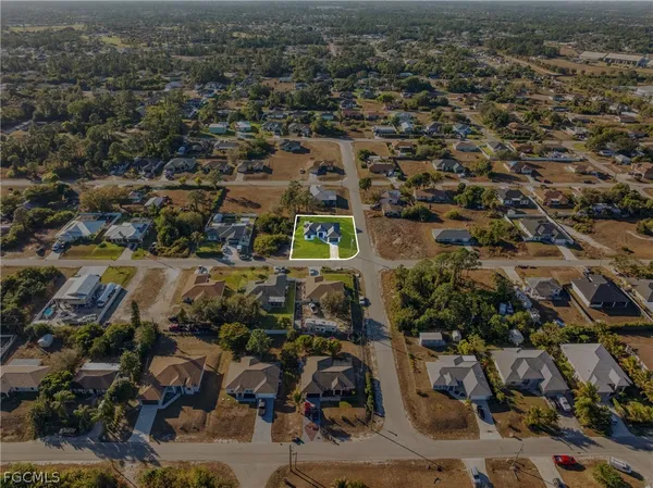 an aerial view of residential house with parking space