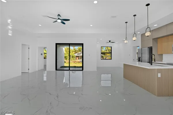 a view of an empty room and window