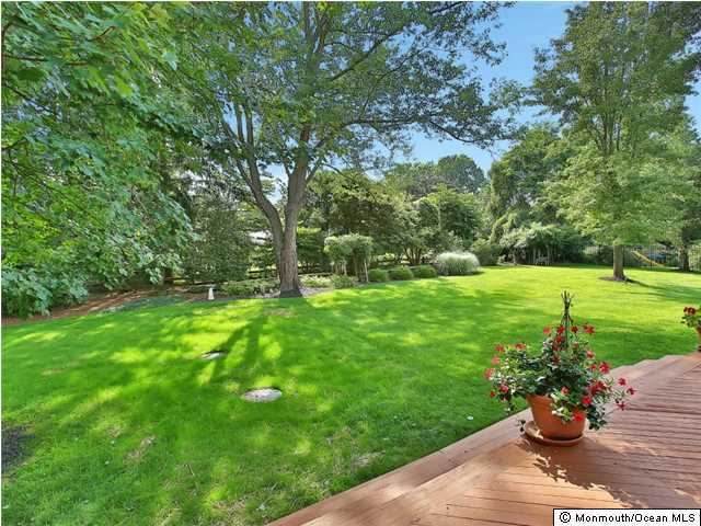 32 Woodhollow Road Colts Neck, NJ 07722 - Photo 19 of 23 a garden view with a seating space