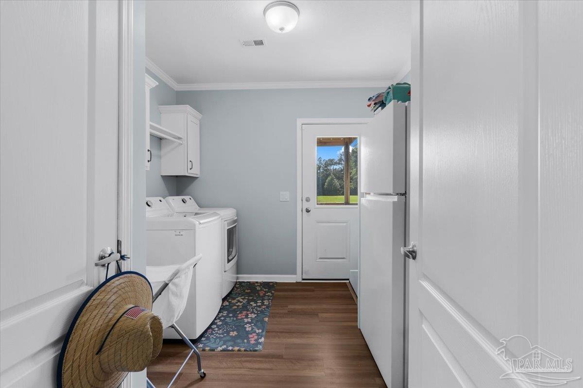 4955 Blue Ribbon Drive Milton, FL 32583 - Photo 21 of 32 a bathroom with a sink and a mirror