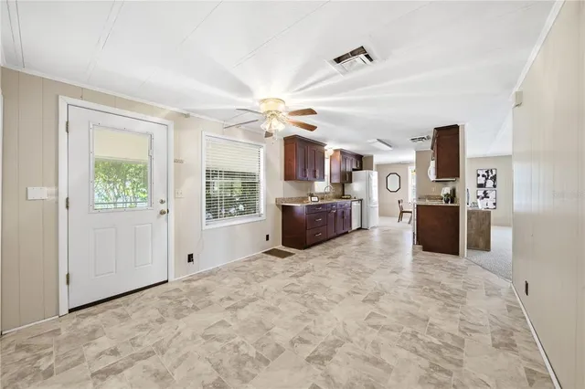 a view of a kitchen with furniture and a kitchen