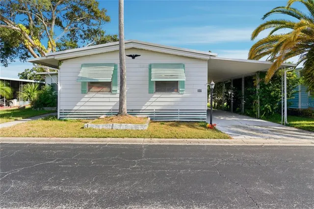 a view of a porch with wooden floor and stairs