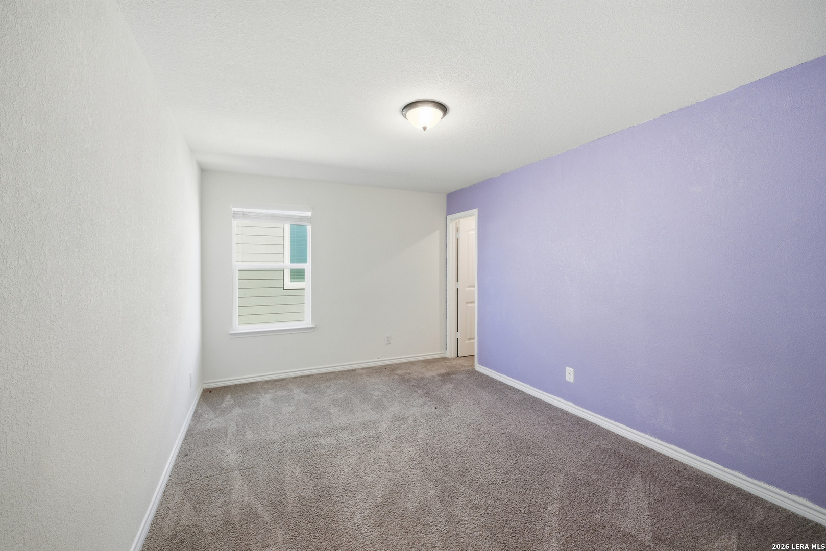11331 Edelweiss San Antonio, TX 78245 - Photo 13 of 19 an empty room with a window