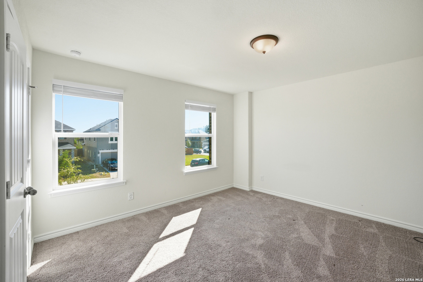11331 Edelweiss San Antonio, TX 78245 - Photo 15 of 19 a view of an empty room with a window