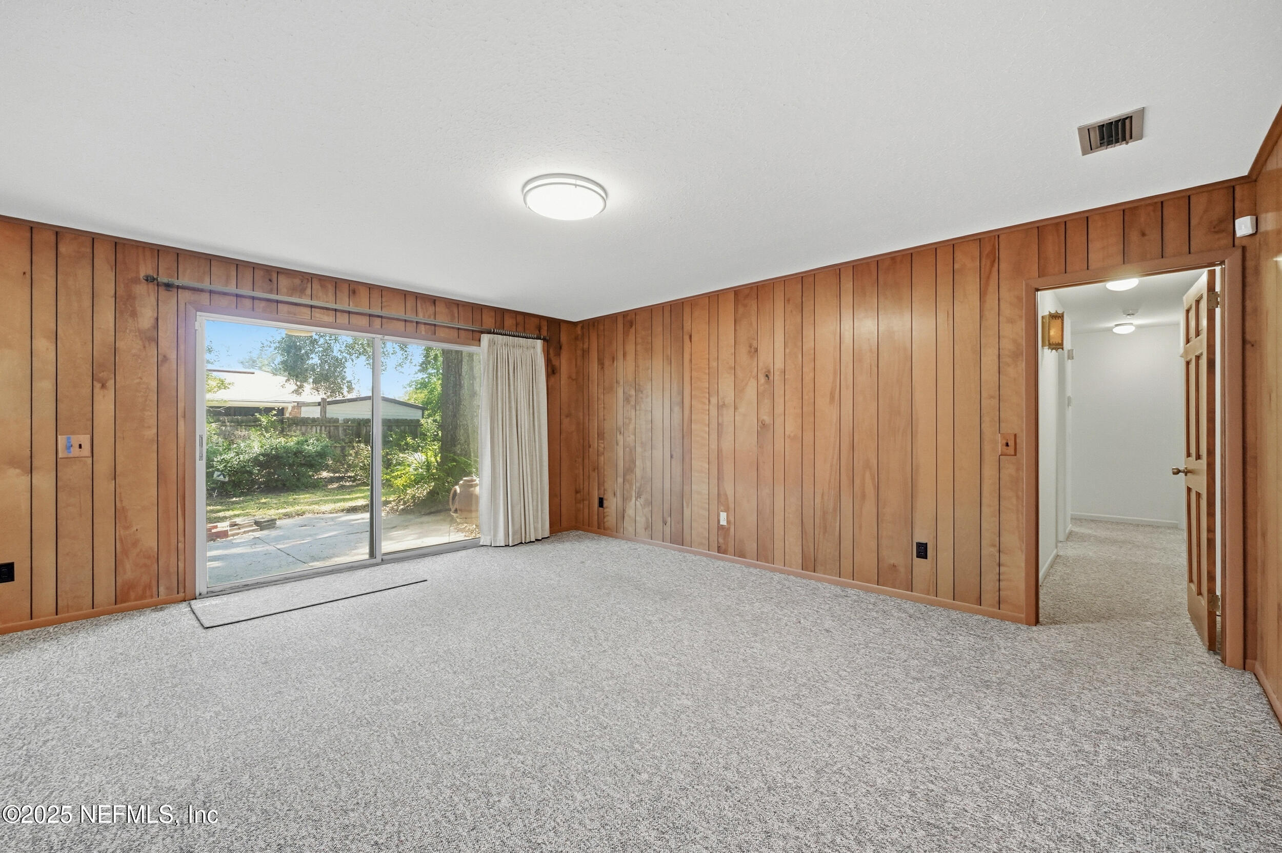 4073 Big Hollow Lane Jacksonville, FL 32277 - Photo 12 of 31 a view of an empty room with a window