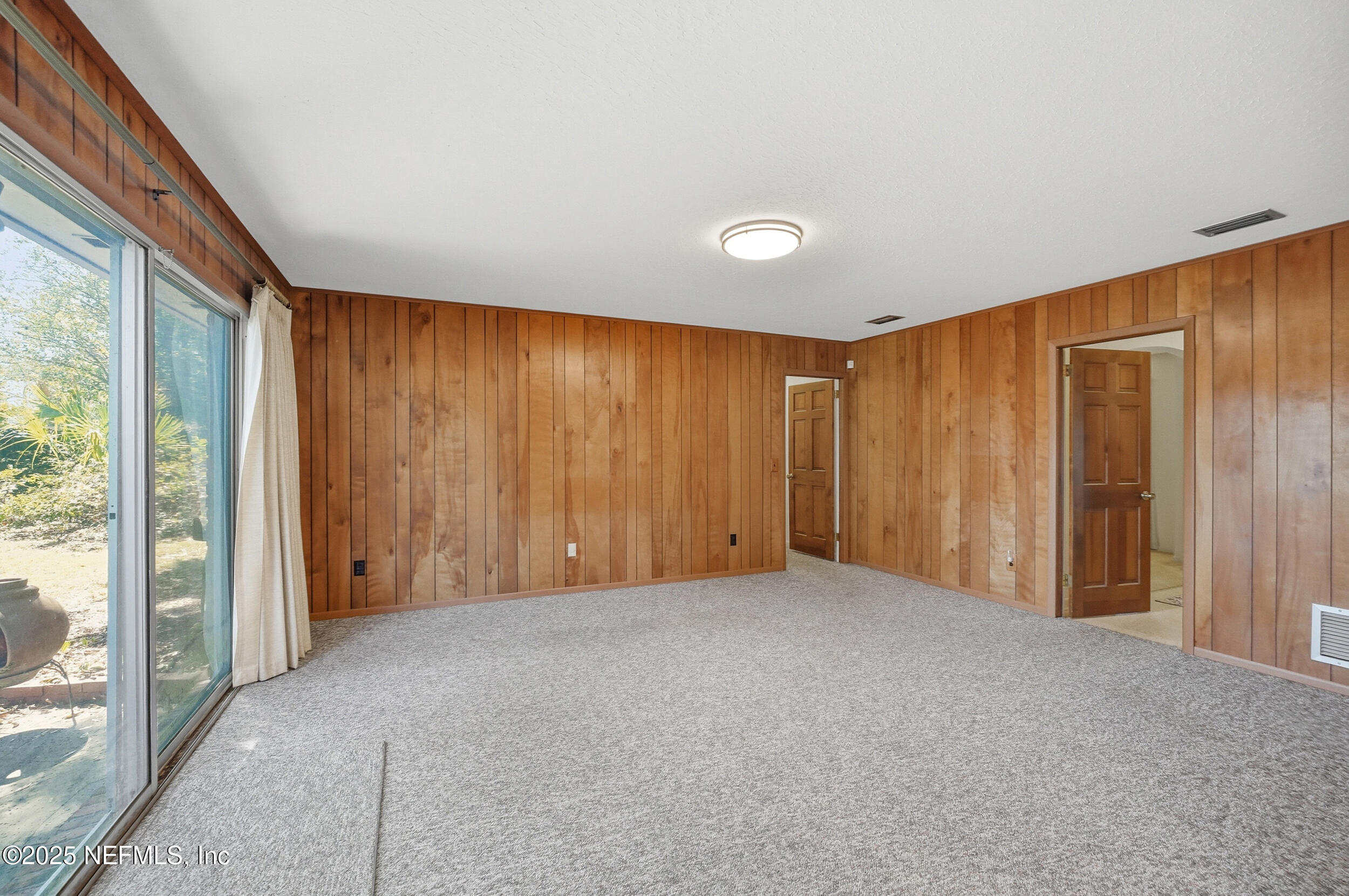 4073 Big Hollow Lane Jacksonville, FL 32277 - Photo 14 of 31 a view of an empty room with a window