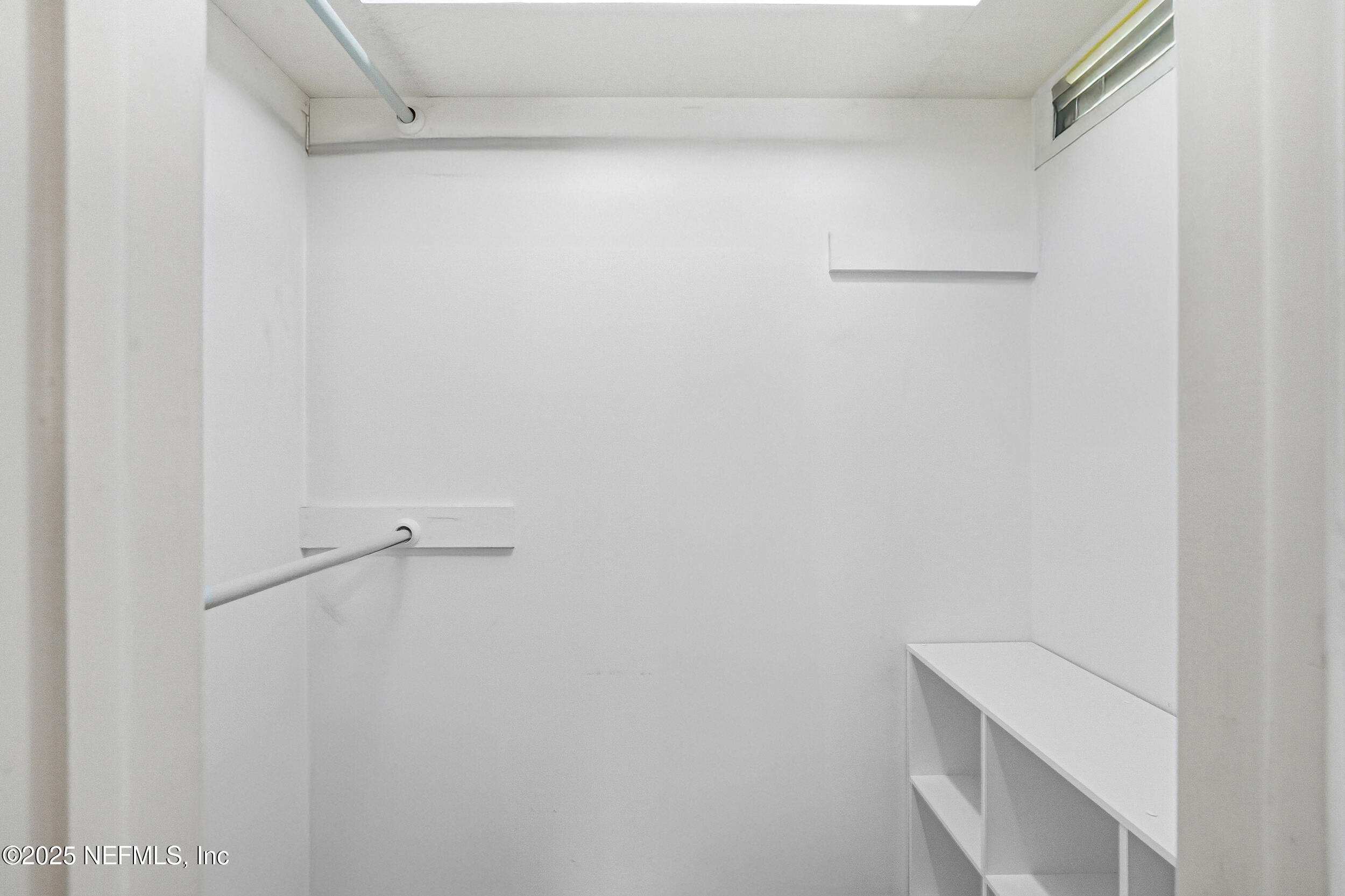 4073 Big Hollow Lane Jacksonville, FL 32277 - Photo 22 of 31 a view of an empty walk in closet