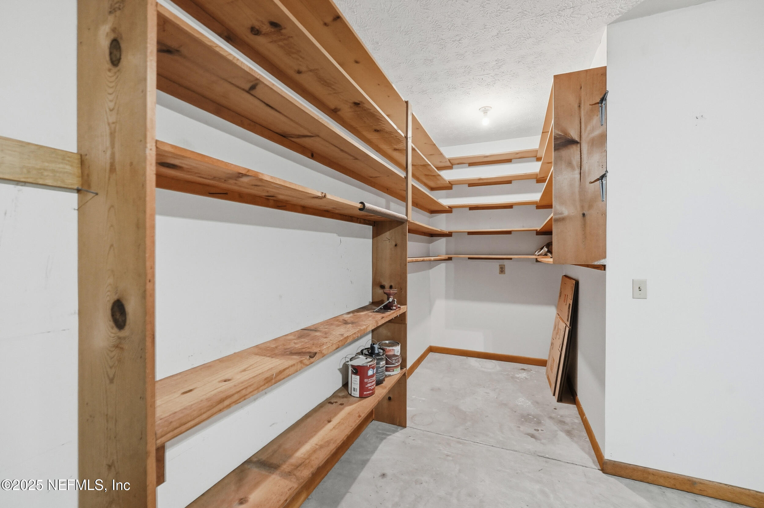 4073 Big Hollow Lane Jacksonville, FL 32277 - Photo 24 of 31 a view of an empty walk in closet