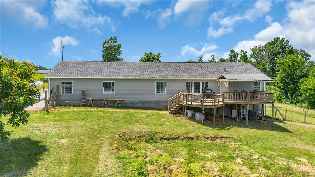 2657 Oak Grove Road Red Boiling Springs, TN 37150 - Photo 35 of 45 a view of a house with a yard and sitting area