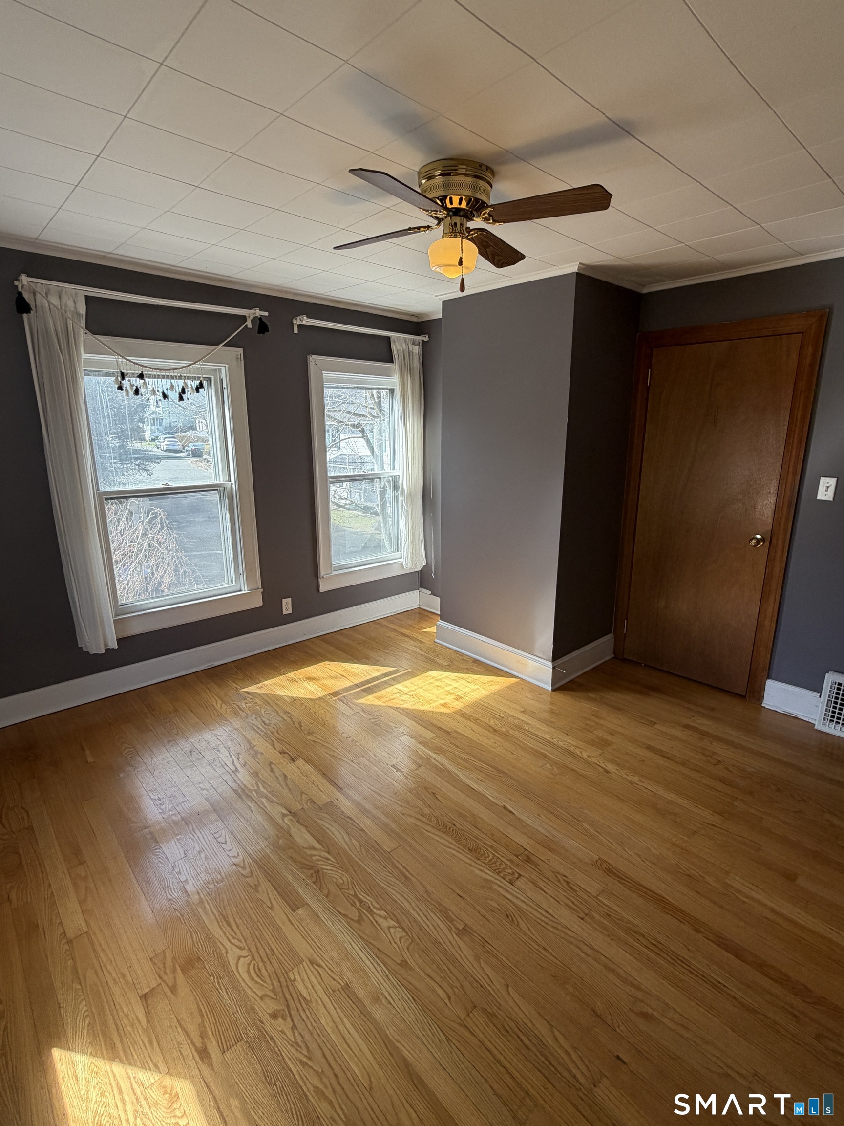 70 Meadow Street Ansonia, CT 06401 - Photo 8 of 12 an empty room with windows