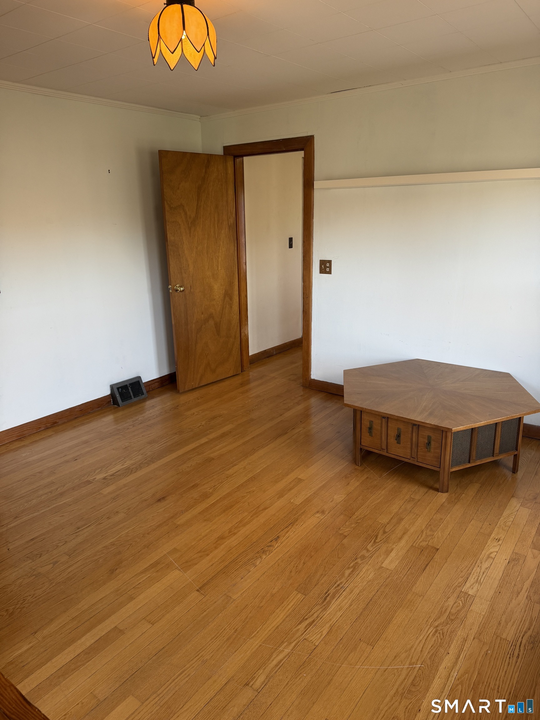 70 Meadow Street Ansonia, CT 06401 - Photo 10 of 12 a living room with couch and a table