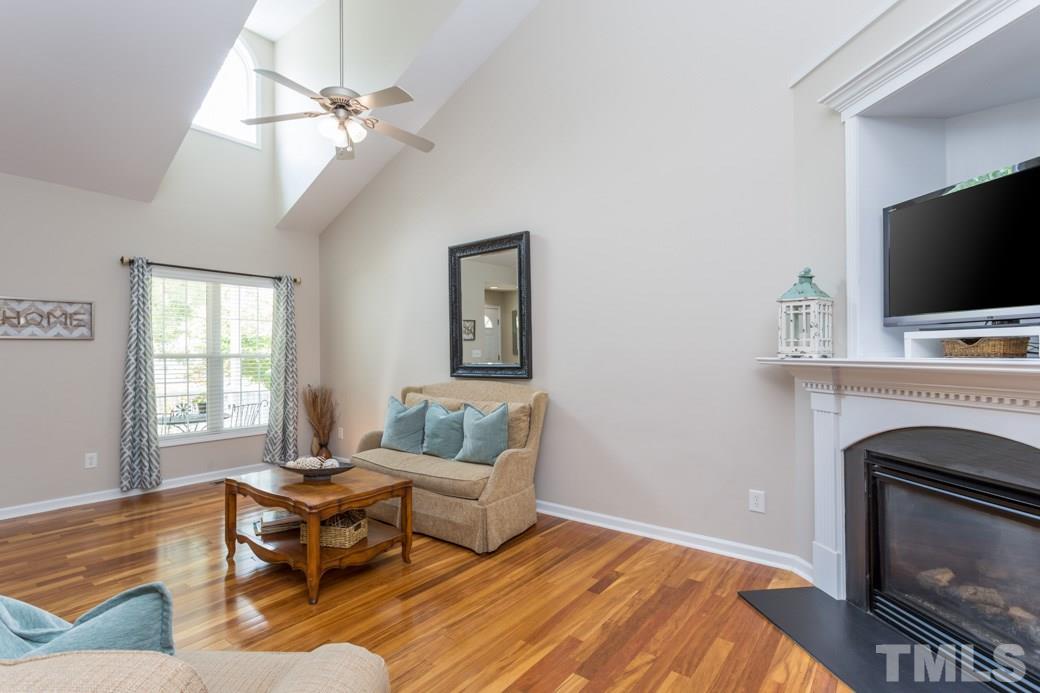 5206 Groveside Court Raleigh, NC 27613 - Photo 2 of 12 a bedroom with a bed and a flat screen tv