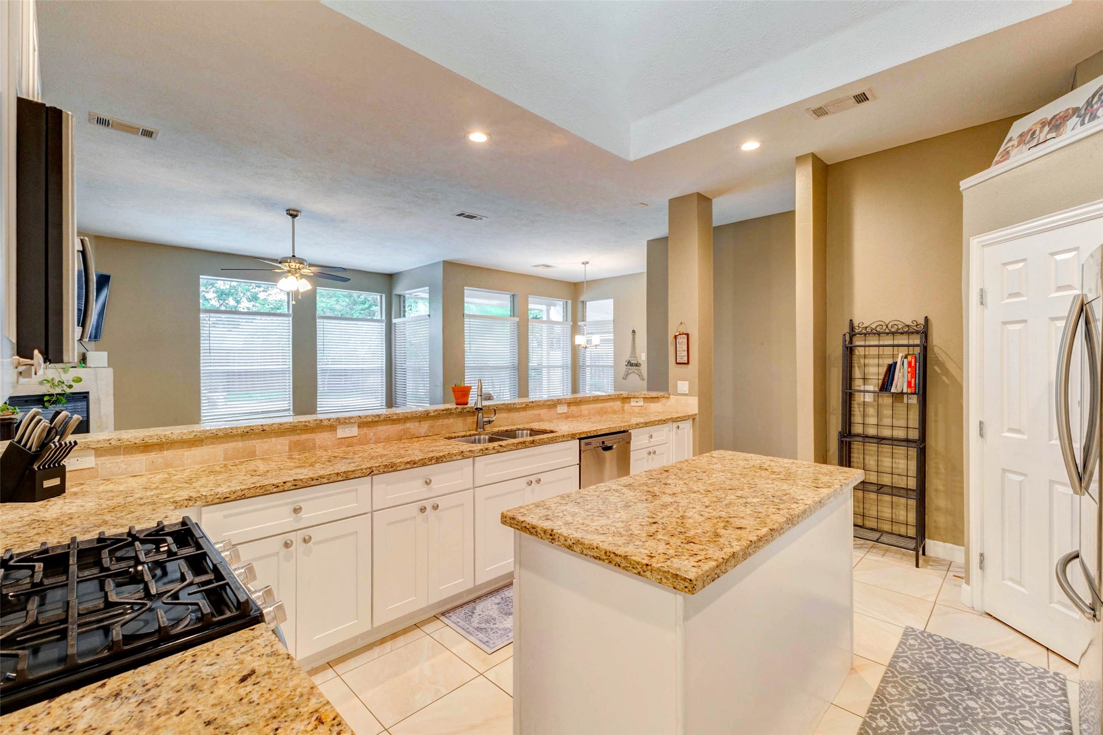 6334 Sampras Ace Court Spring, TX 77379 - Photo 18 of 48 An Island AND a bar!!!