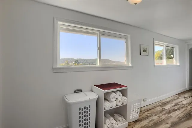 a bathroom with a sink and a window