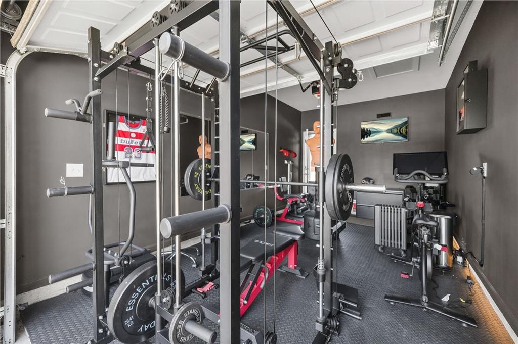 118 Arabella Pike Locust Grove, GA 30248 - Photo 35 of 39 a view of a room with gym equipment