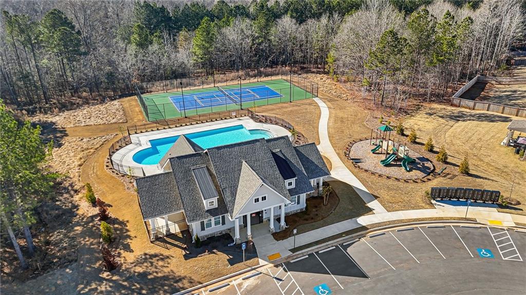 118 Arabella Pike Locust Grove, GA 30248 - Photo 36 of 39 a view of a swimming pool with a patio