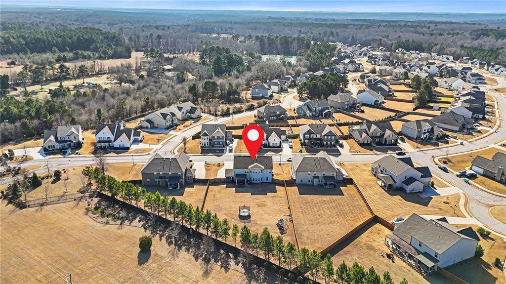118 Arabella Pike Locust Grove, GA 30248 - Photo 38 of 39 an aerial view of residential houses with outdoor space
