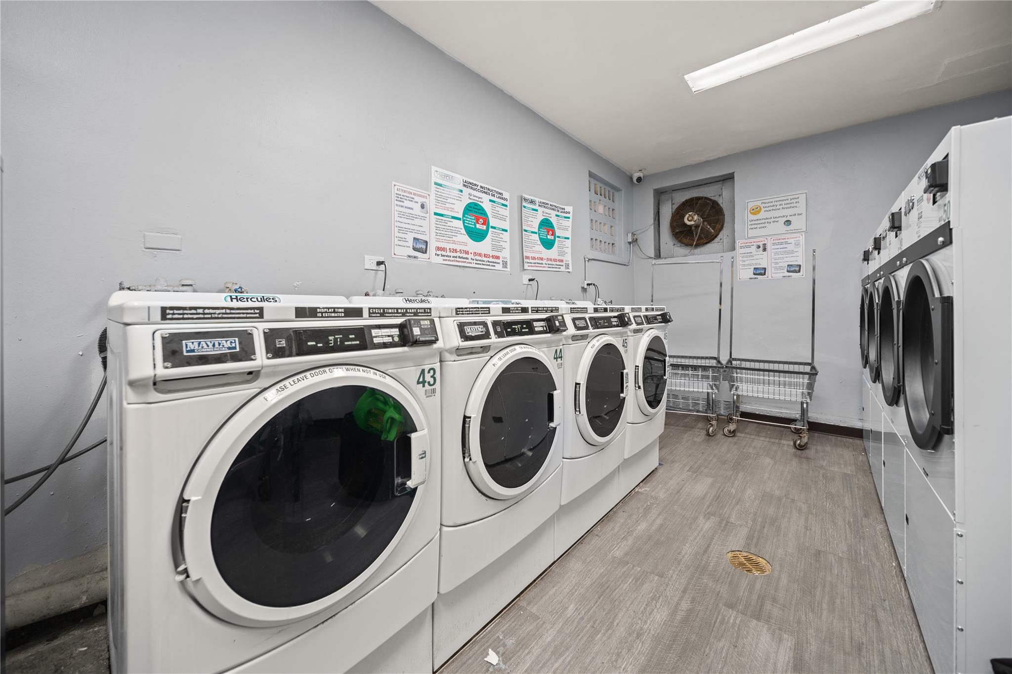 1199 East 53rd Street, Unit 1D Brooklyn, NY 11234 - Photo 8 of 10 a utility room with dryer and washer