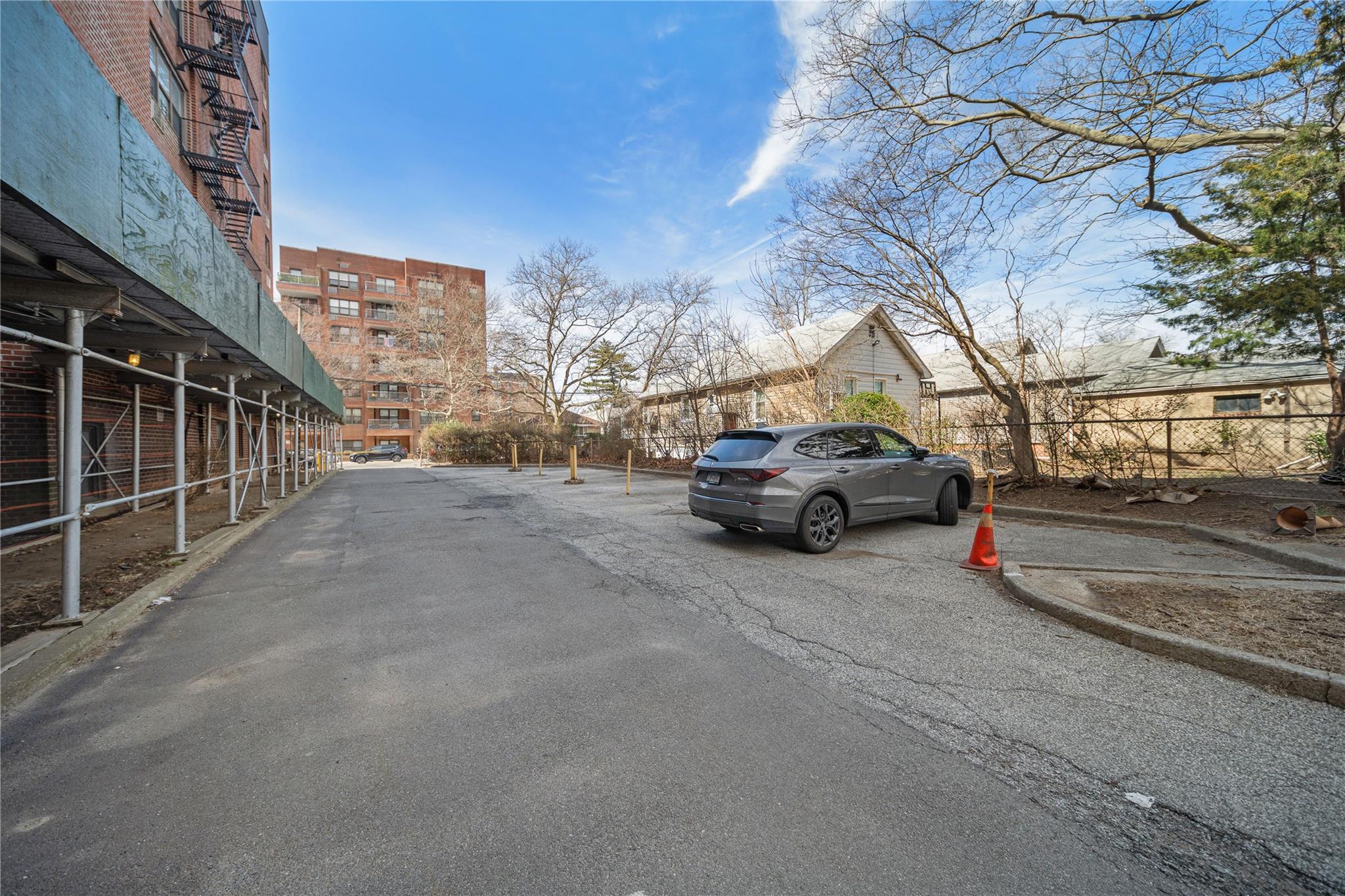 1199 East 53rd Street, Unit 1D Brooklyn, NY 11234 - Photo 9 of 10 a view of street with parked cars