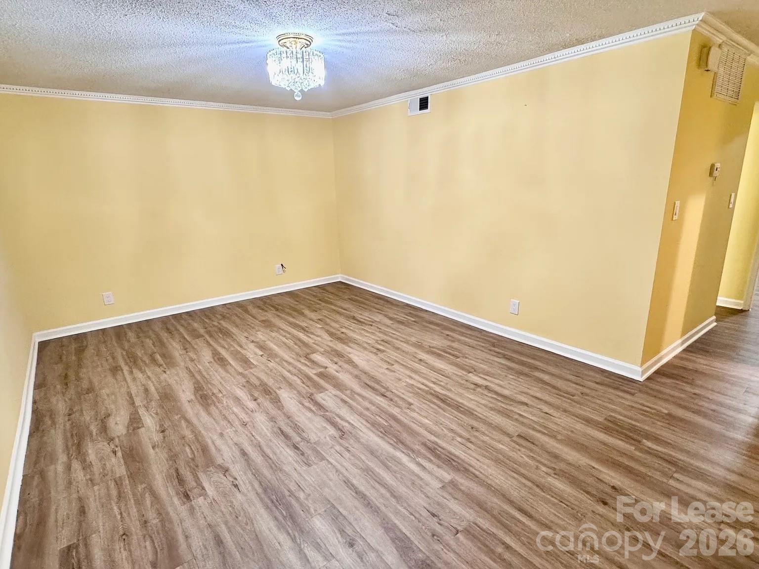5808 Hunting Ridge Lane, Unit A Charlotte, NC 28212 - Photo 3 of 7 wooden floor in a room