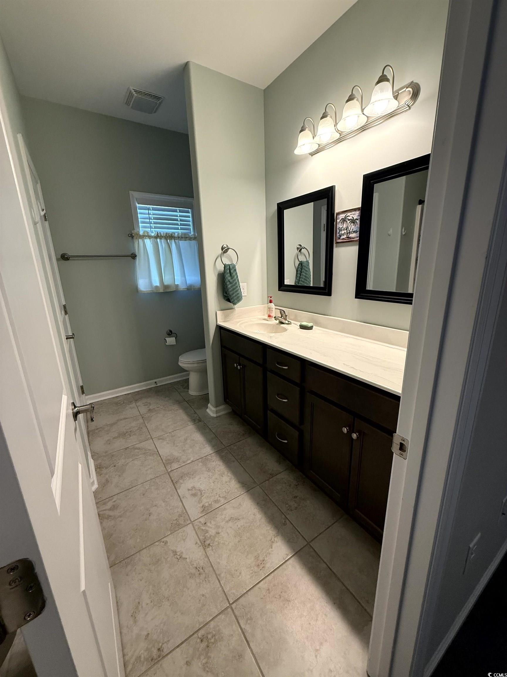 257 Maiden's Choice Drive Conway, SC 29527 - Photo 21 of 29 Full bathroom featuring vanity and light tile patterned flooring