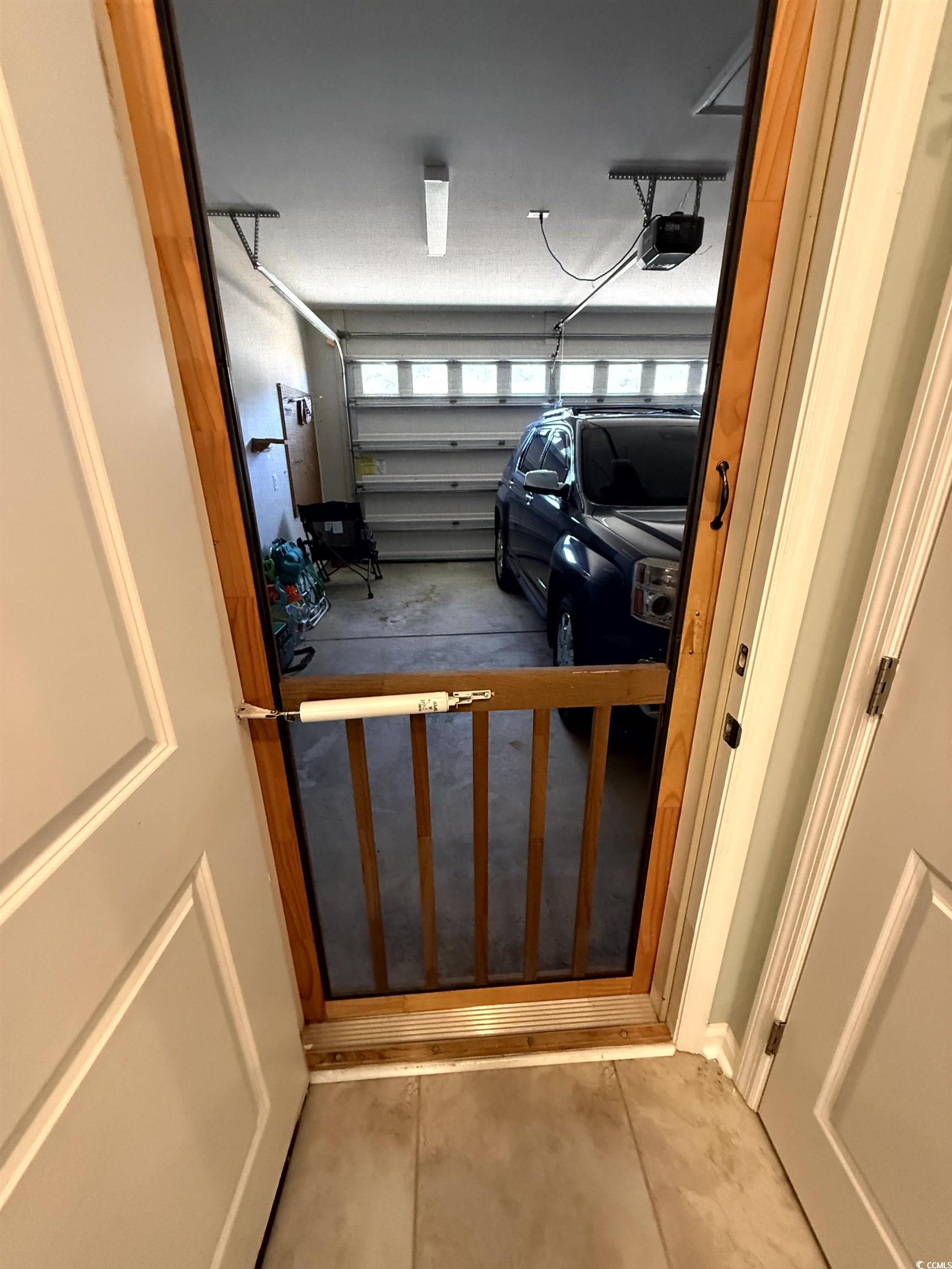 257 Maiden's Choice Drive Conway, SC 29527 - Photo 25 of 29 Garage with a garage door opener