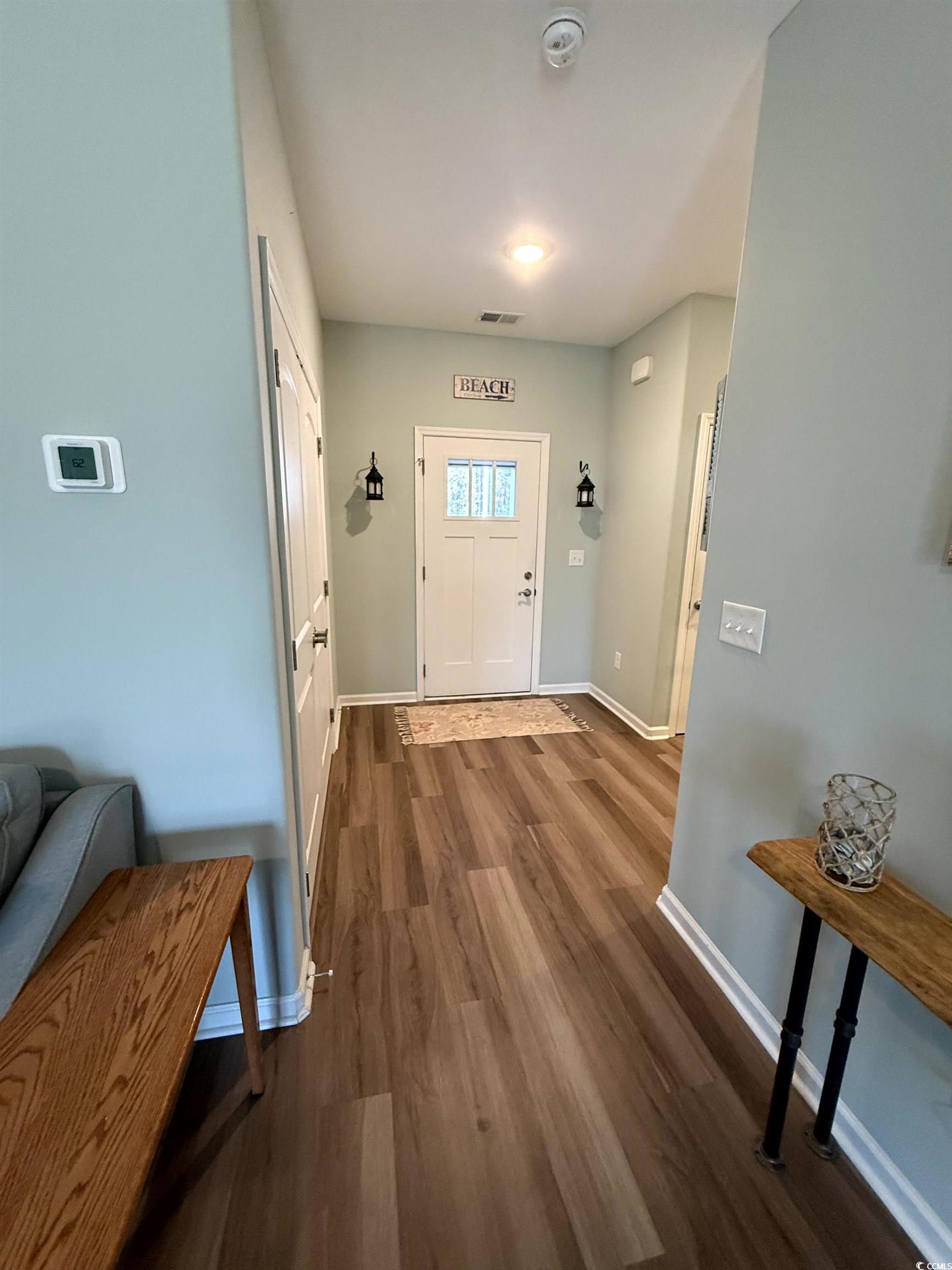 257 Maiden's Choice Drive Conway, SC 29527 - Photo 4 of 29 Entryway with baseboards and wood finished floors