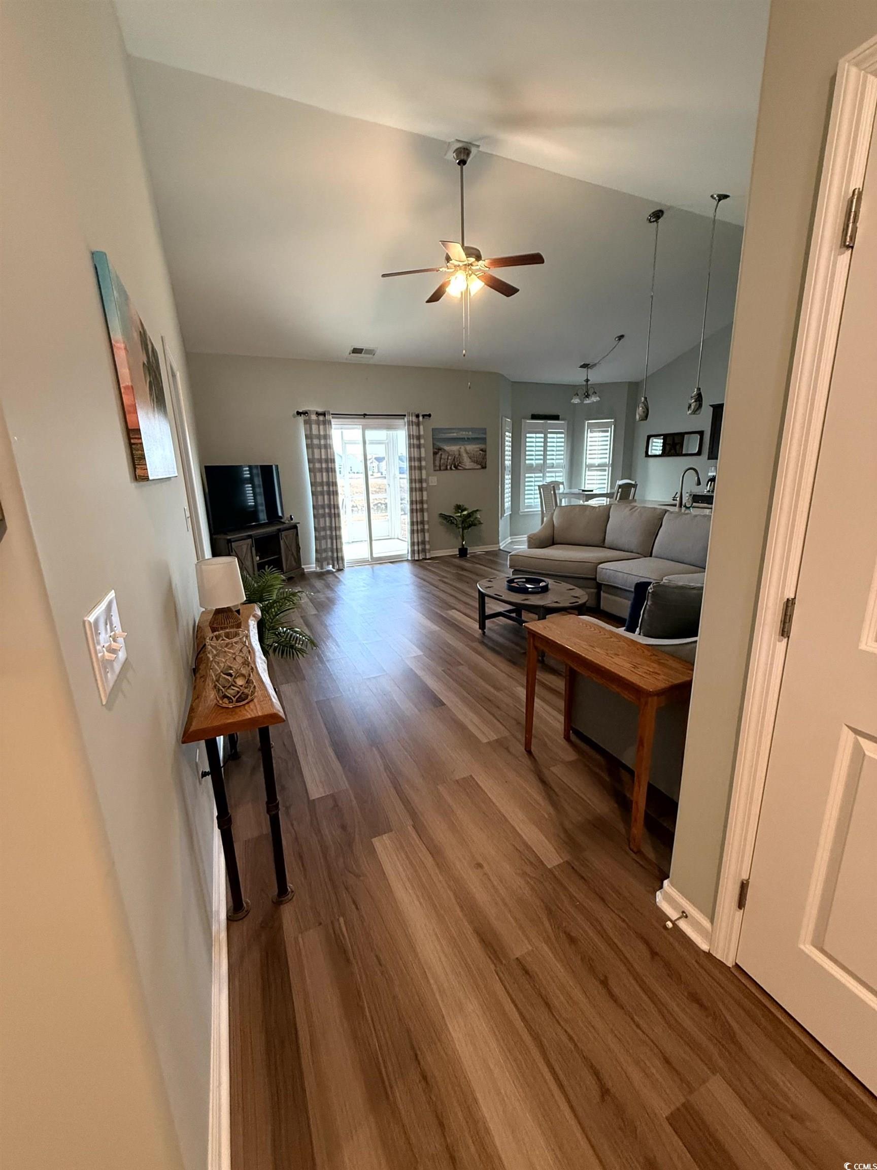 257 Maiden's Choice Drive Conway, SC 29527 - Photo 7 of 29 Living area featuring lofted ceiling, light wood-type flooring, and ceiling fan