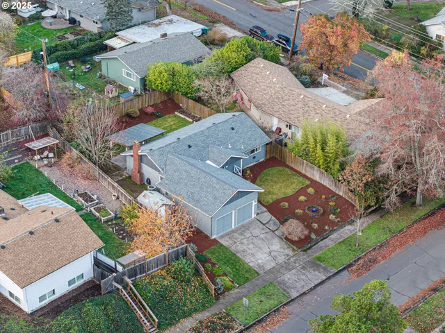 an aerial view of a house with a garden