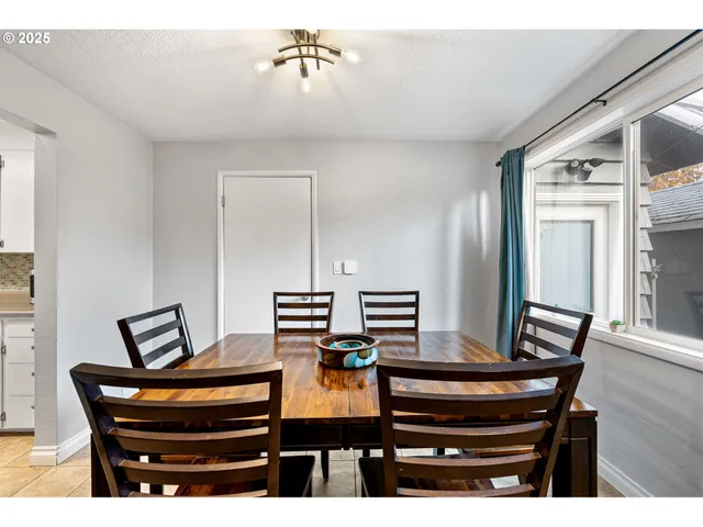 a view of room with furniture and wooden floor