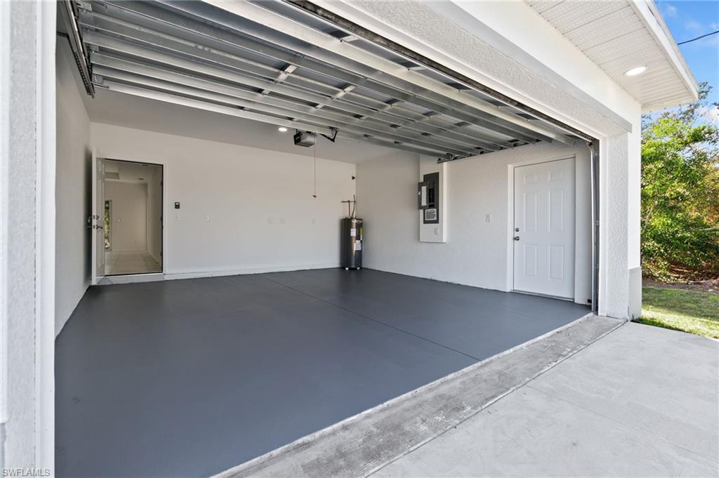3707 Sunset Road Lehigh Acres, FL 33971 - Photo 5 of 16 a view of a livingroom with a staircase