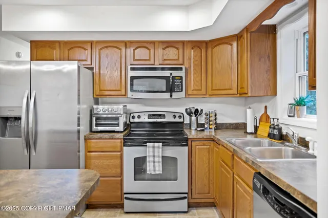 with aerial view of a house with a swimming pool
