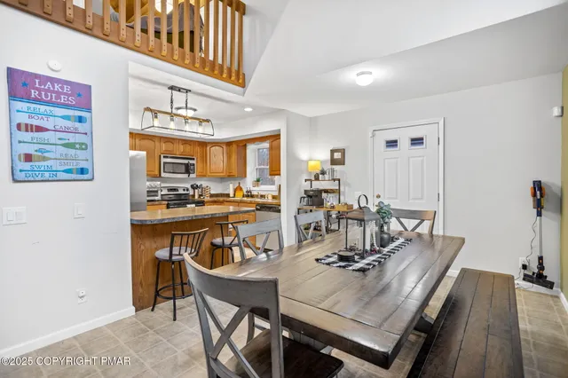 a view of a dining room with furniture